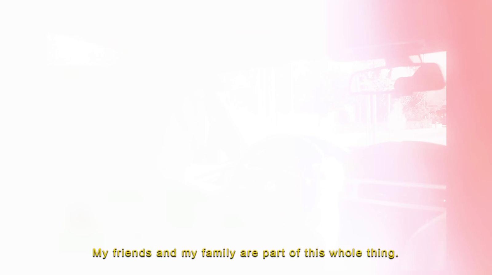 a white wall with a pink and yellow background