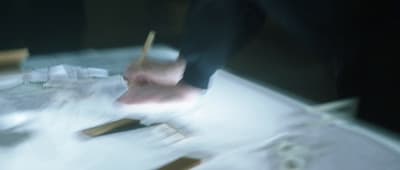 a blurry photo of a person holding a toothbrush