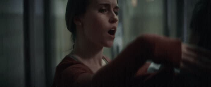 a woman with a surprised look on her face