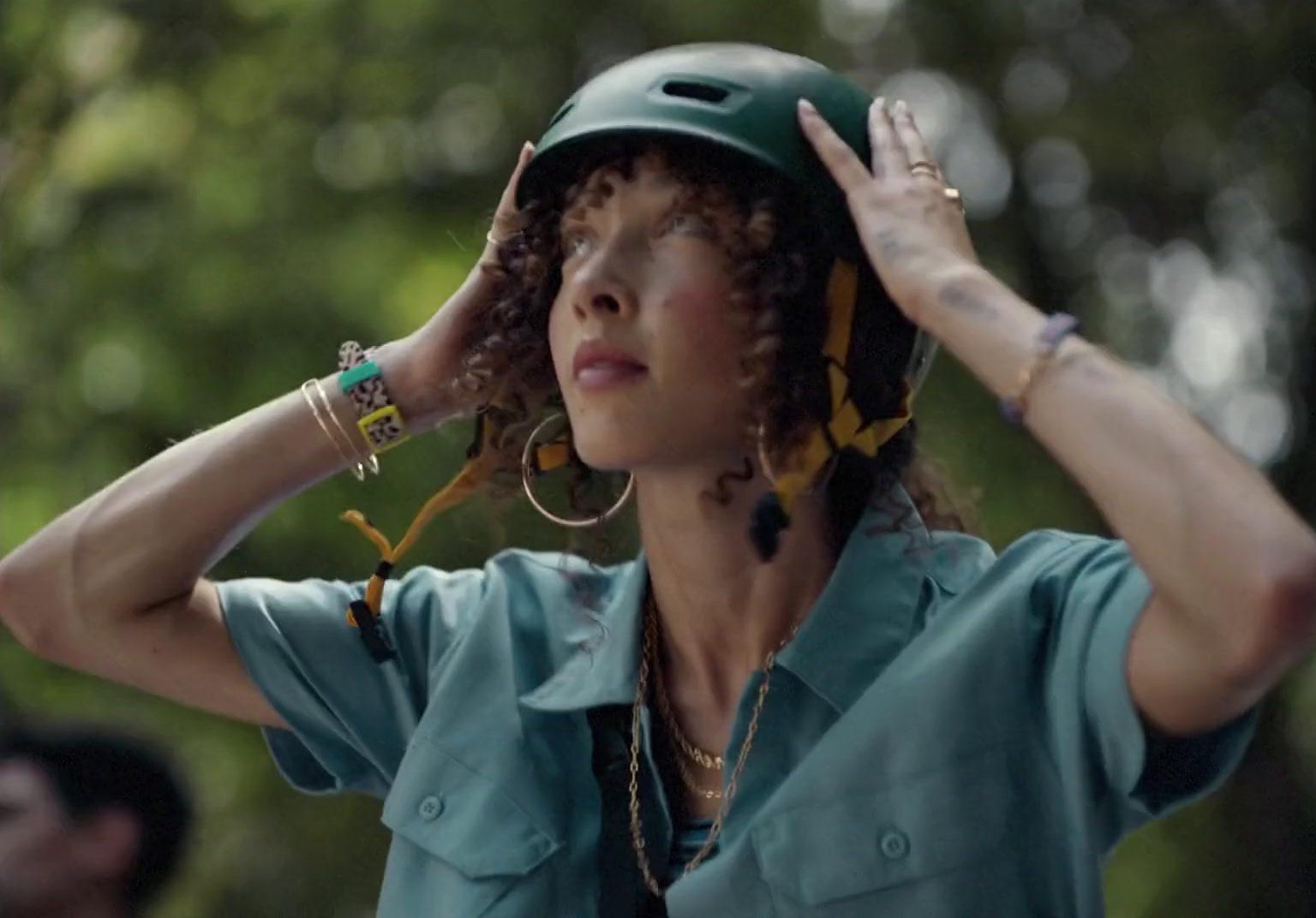 a woman with a helmet on her head