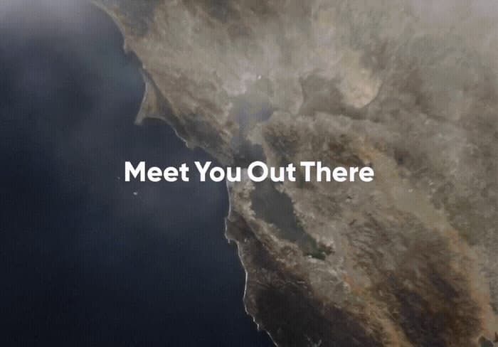 a satellite image of a large body of water with the words meet you out there