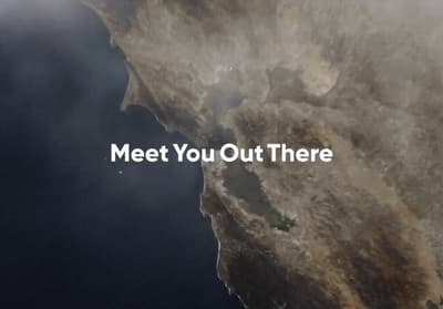a satellite image of a large body of water with the words meet you out there