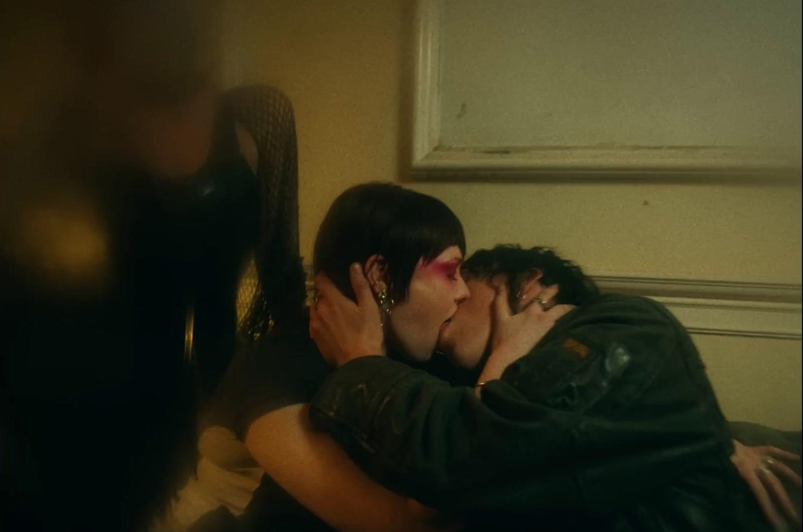 a couple of people that are kissing each other