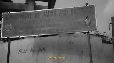 a sign that is on the side of a building