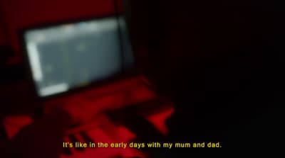 a blurry photo of a computer screen with a red background