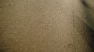 a blurry photo of a person riding a skateboard