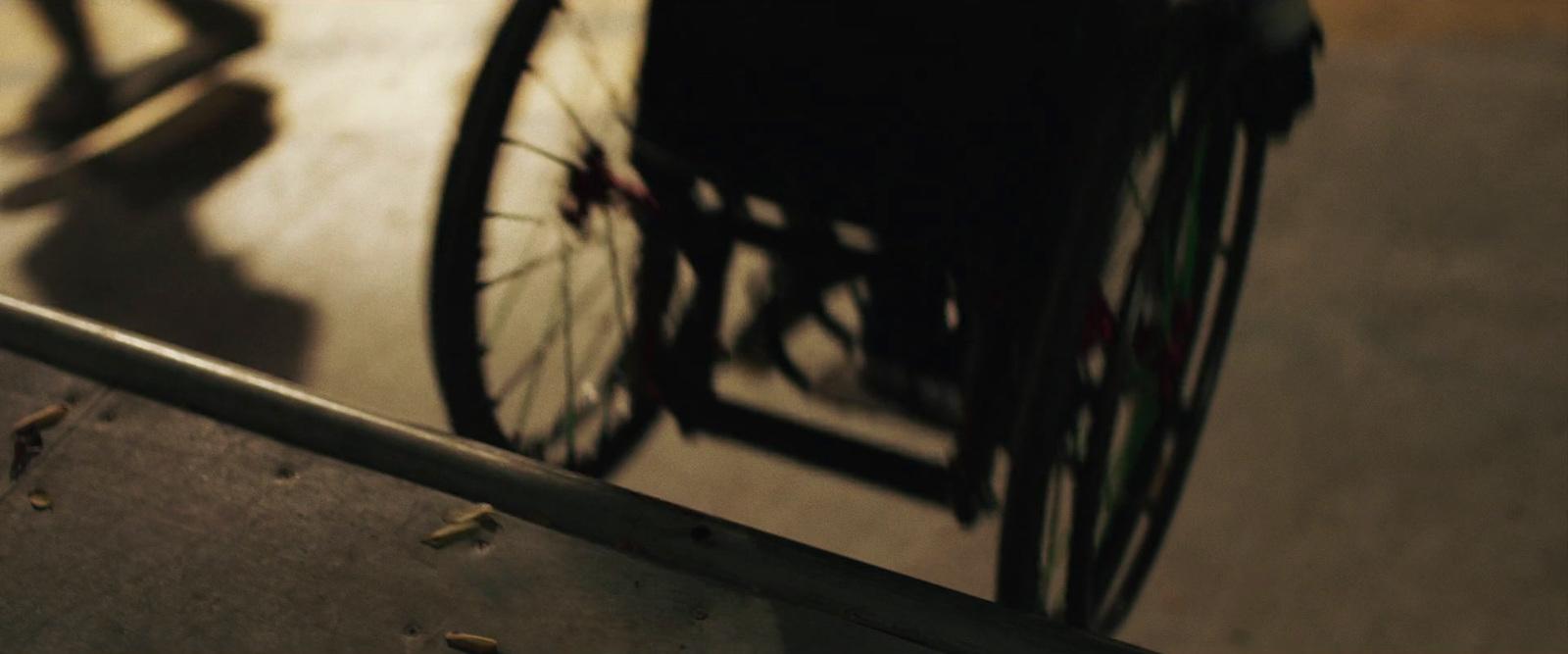 a person in a wheelchair on a ramp