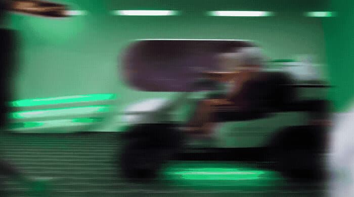 a blurry photo of a person sitting in a chair