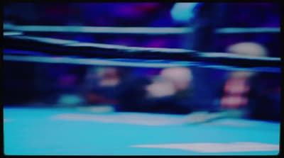 a blurry photo of a boxing ring