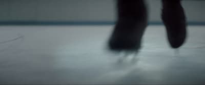 a blurry photo of a person's feet on a skateboard