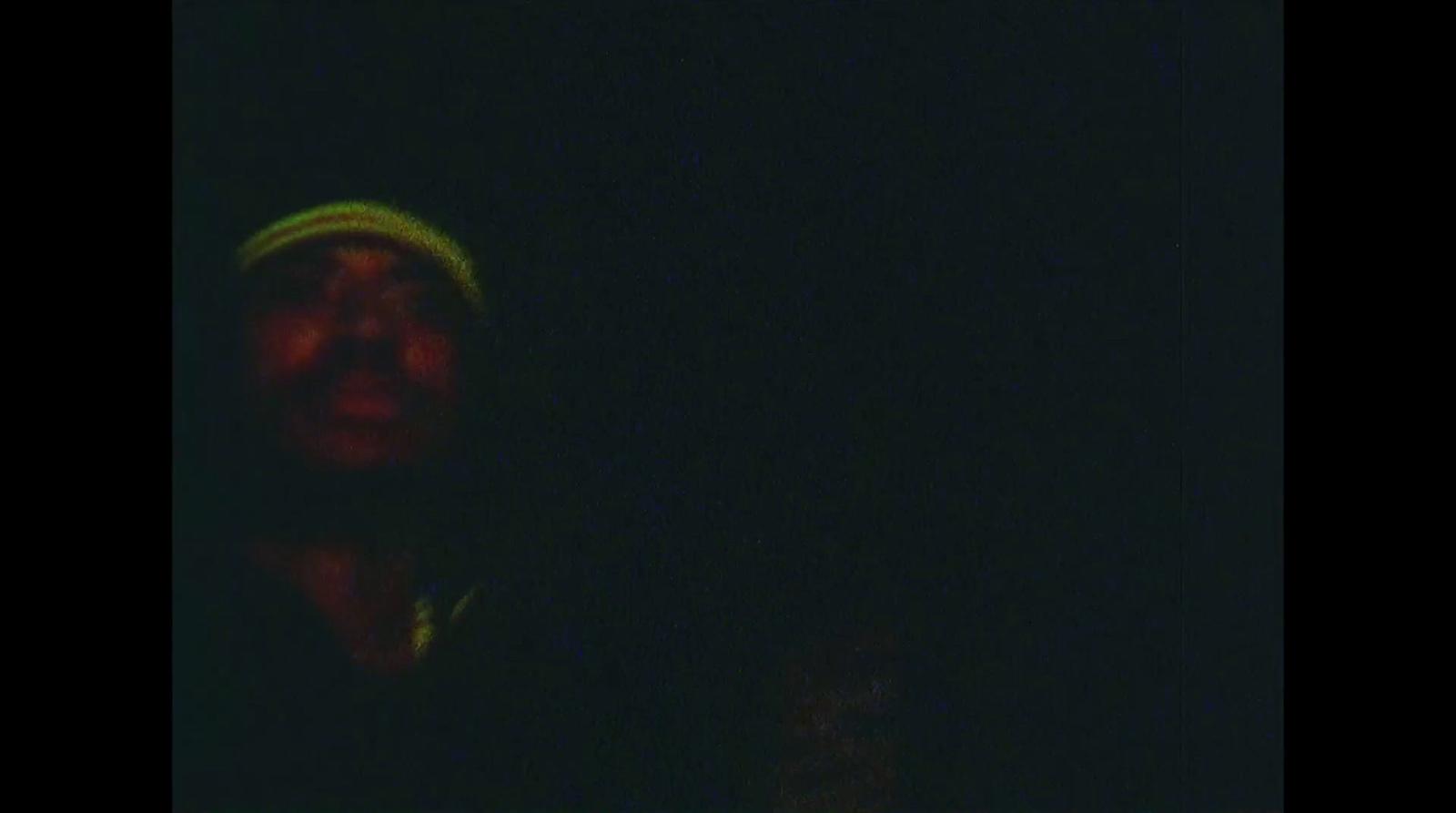 a blurry image of a person in the dark
