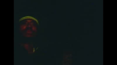 a blurry image of a person in the dark