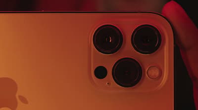 a close up of a person holding an iphone