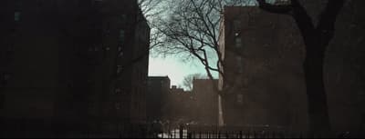 a city street filled with lots of tall buildings