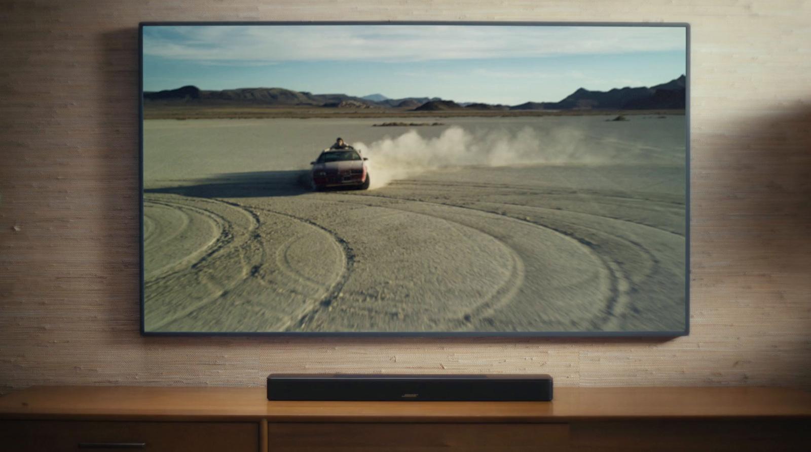 a picture of a car driving in the desert
