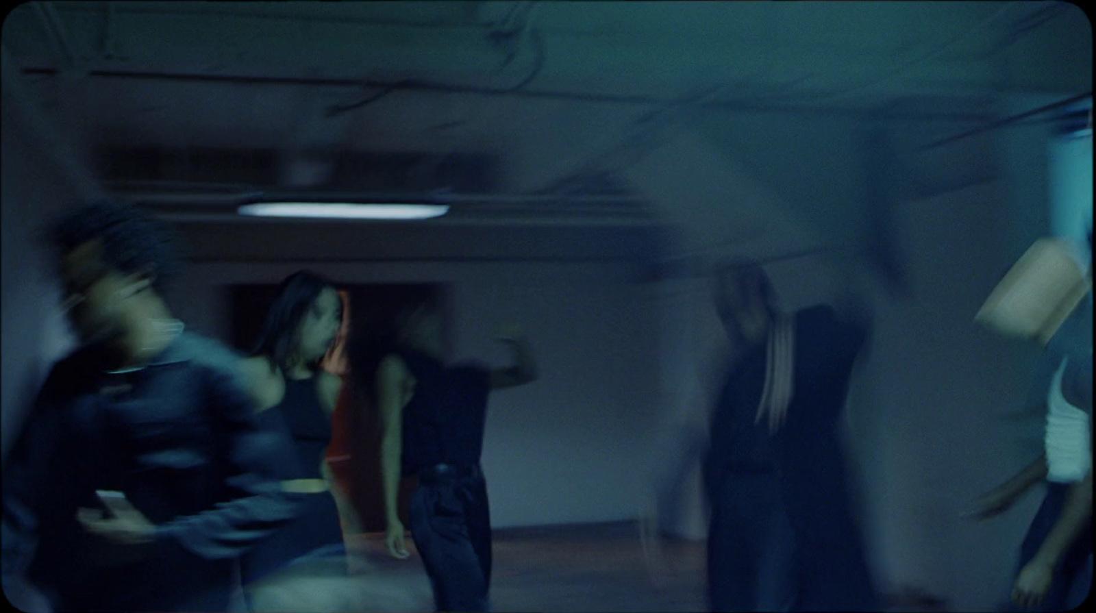 a group of people standing in a room