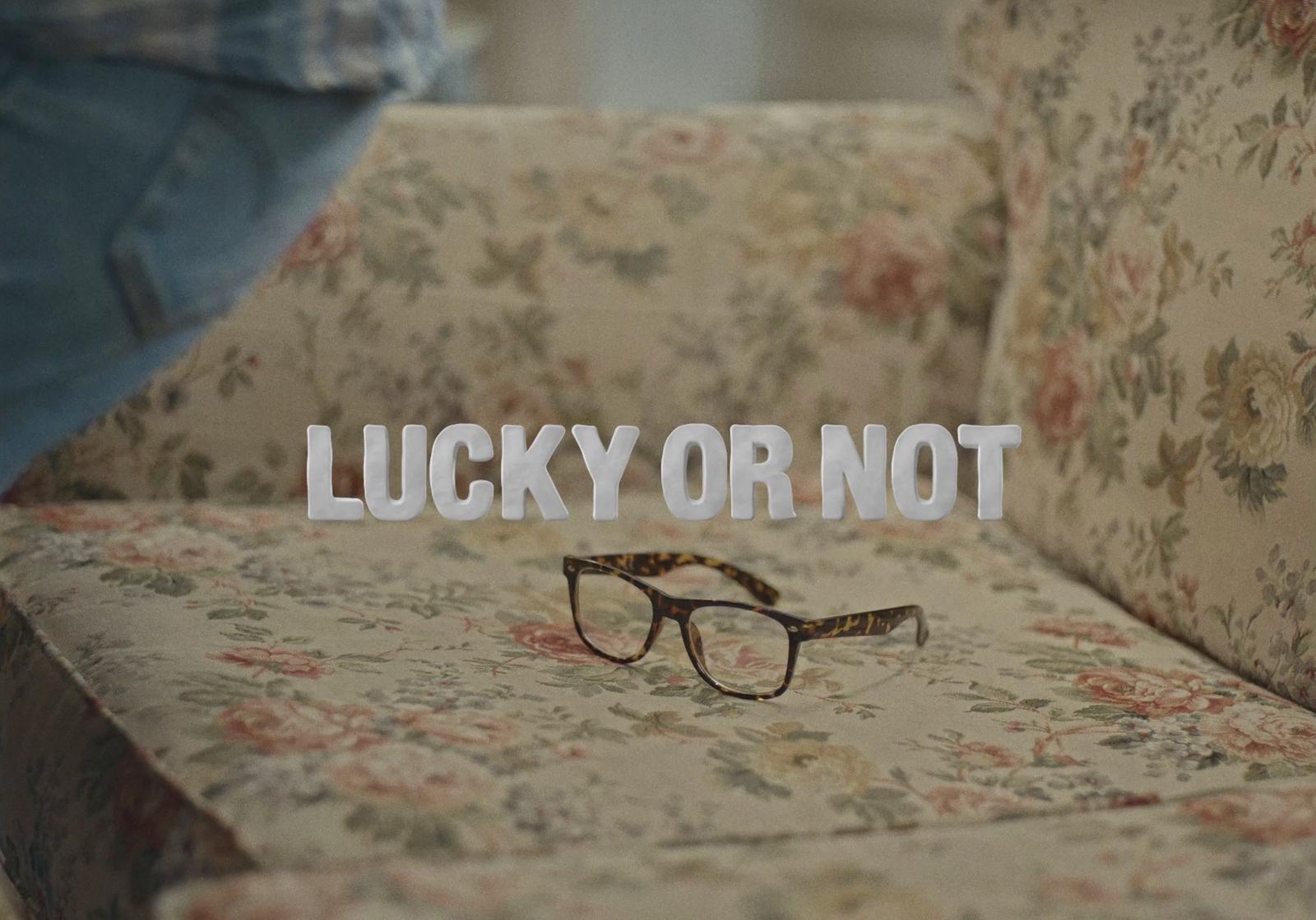 a pair of glasses sitting on top of a couch