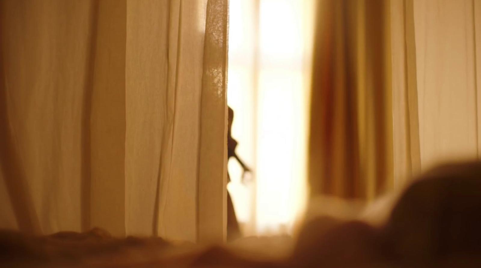 a blurry photo of a person's reflection in a mirror