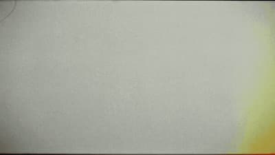 a black and white photo with a red and yellow border