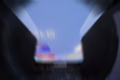 a blurry photo of a building with a clock tower in the background