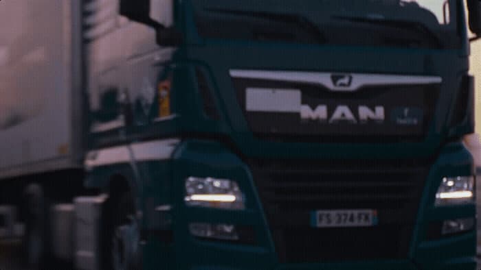 a close up of a truck on a city street