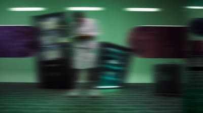 a blurry photo of a skateboarder doing a trick