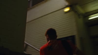 a man walking down a flight of stairs