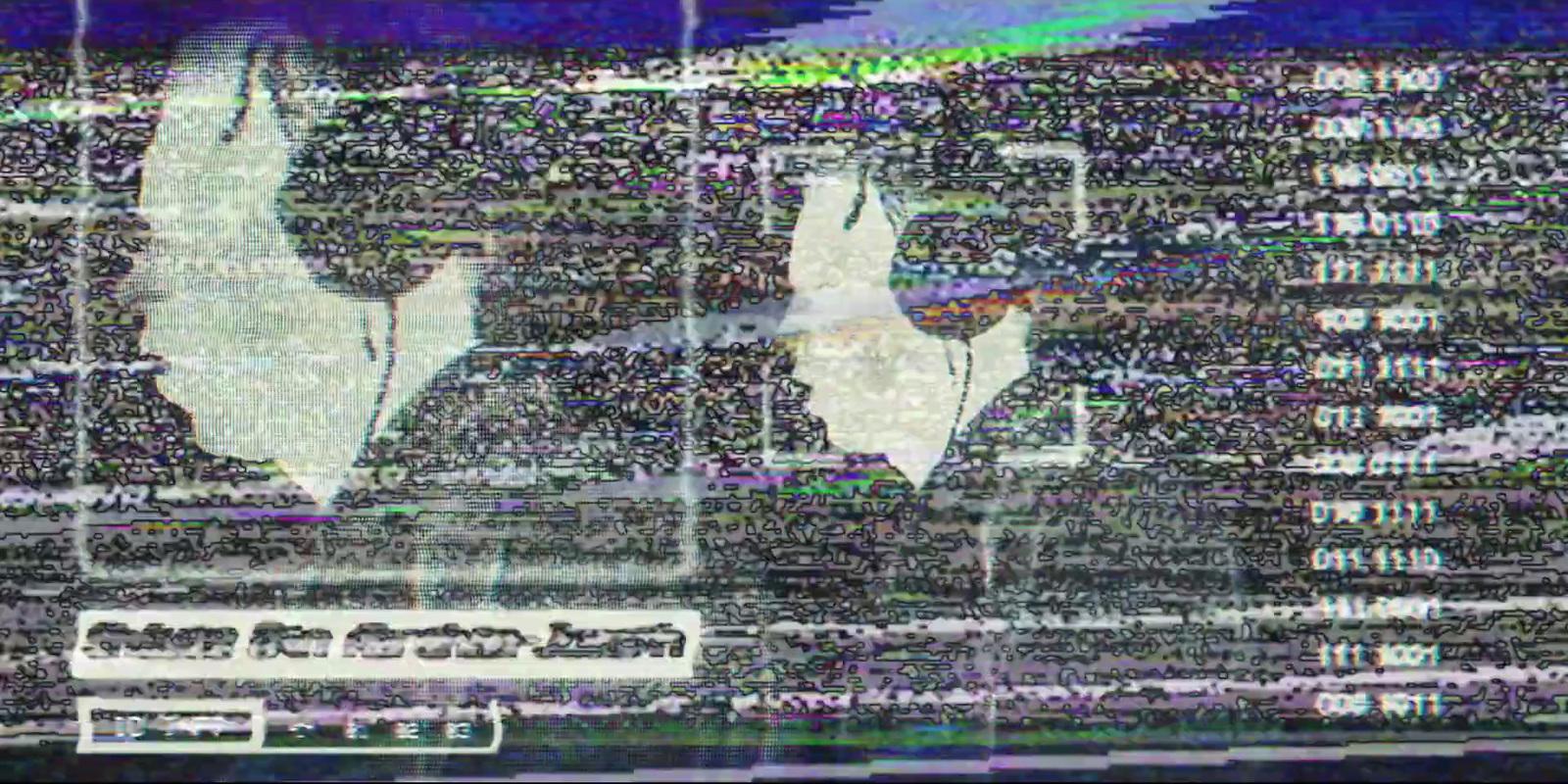 a television screen with a picture of two people on it