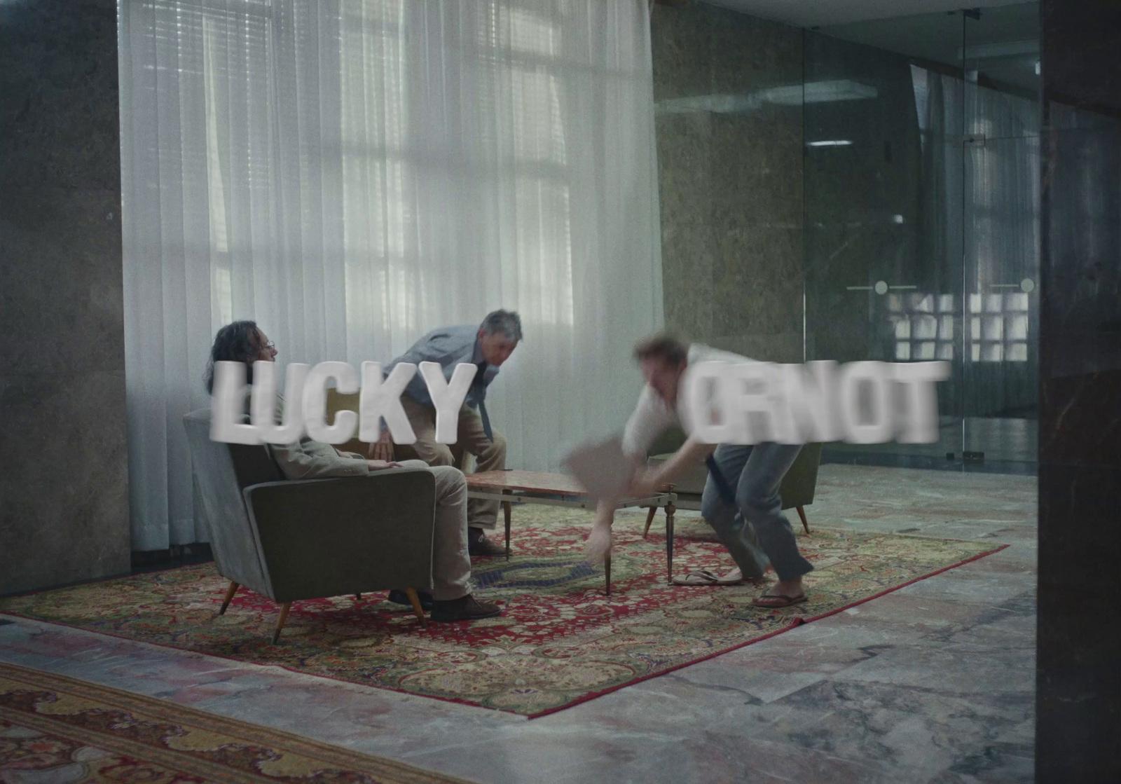 a group of people sitting around a living room