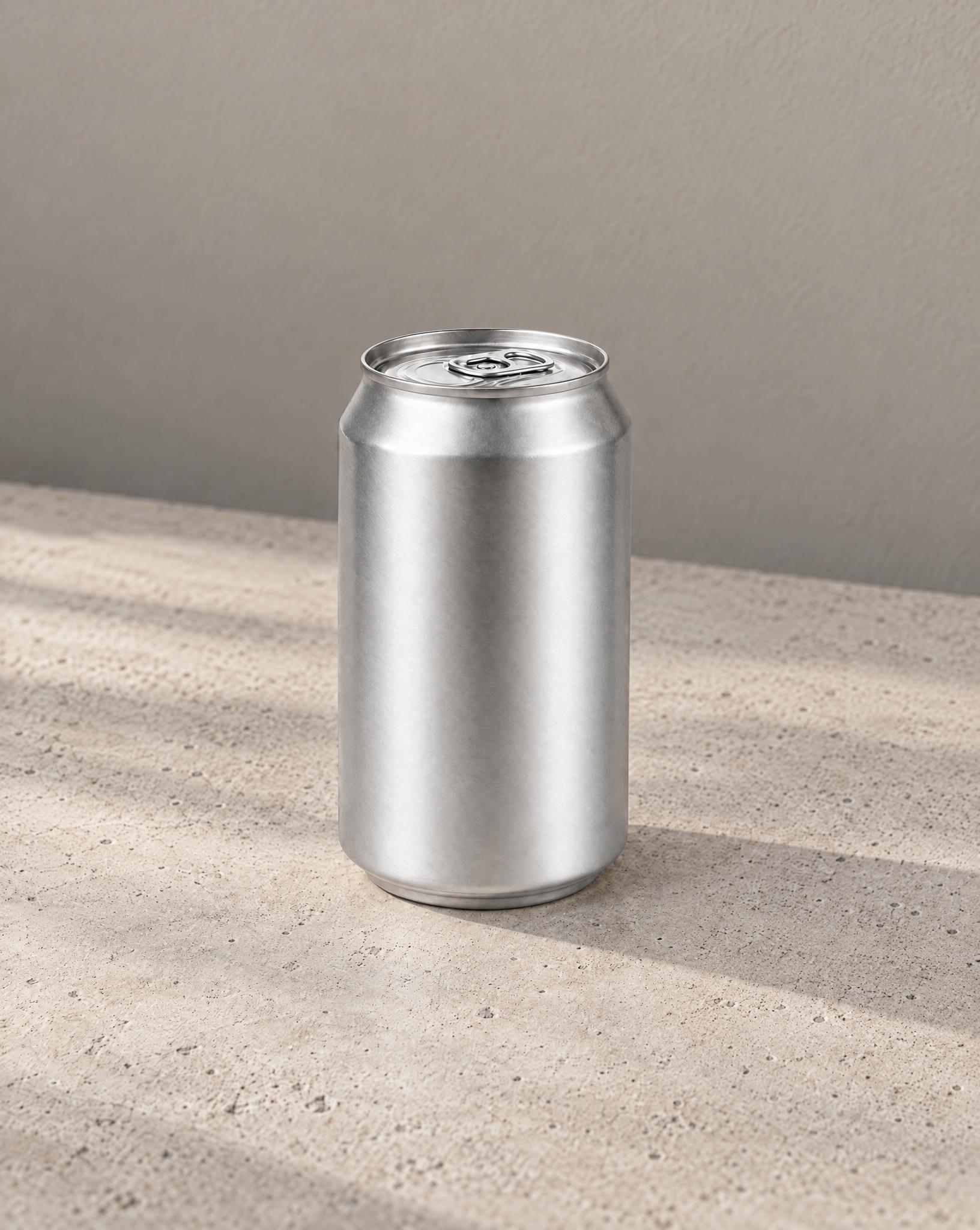 Silver can on a concrete surface next to a crumpled receipt, a phone charger and a set of keys, and the same shot with the clutter removed - After