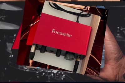 a person holding a red box with the word focusite on it