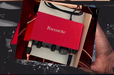 a person holding a red box with the word focusite on it
