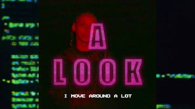 a picture of a man with a neon sign in front of him