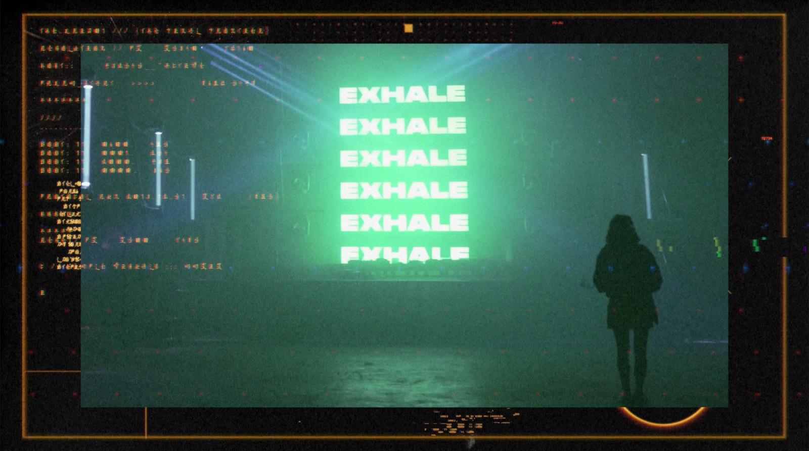a person standing in front of a green screen
