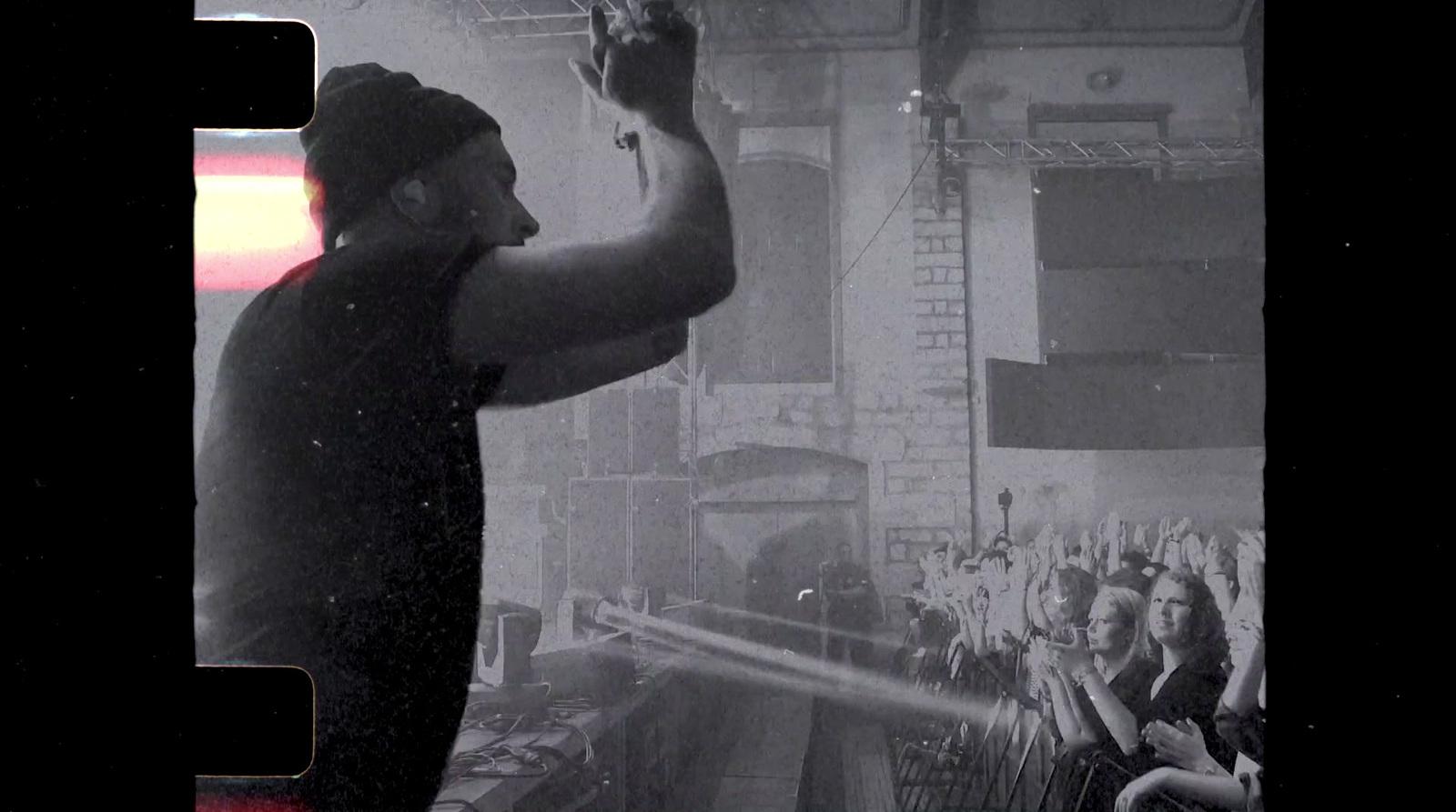 a man standing in front of a crowd of people