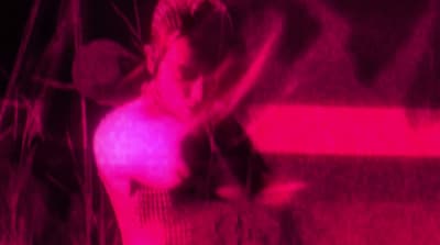 a blurry image of a person on a skateboard